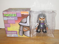 
              Teenage Mutant Ninja Turtles x Kidrobot Shredder 7" Vinyl Figure (Purple/Grey)
            