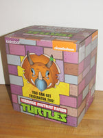 
              Teenage Mutant Ninja Turtles x Kidrobot Shredder 7" Vinyl Figure (Purple/Grey)
            