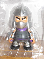 
              Teenage Mutant Ninja Turtles x Kidrobot Shredder 7" Vinyl Figure (Purple/Grey)
            